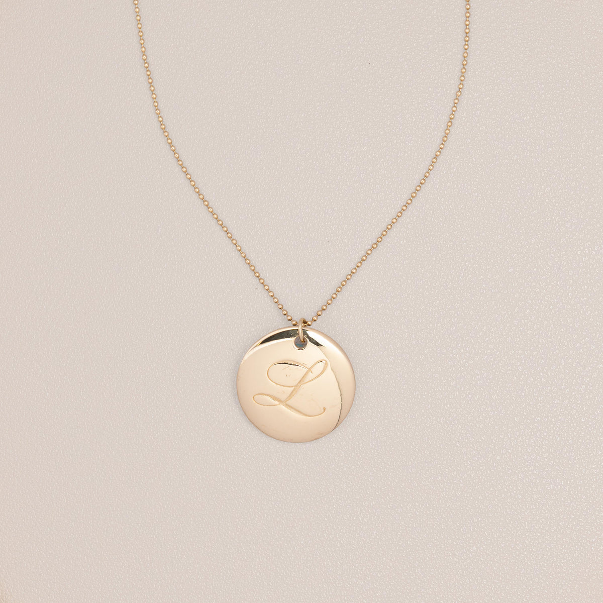 Tiffany & Co. 18K Yellow Gold Notes Letter L Pendant — full view