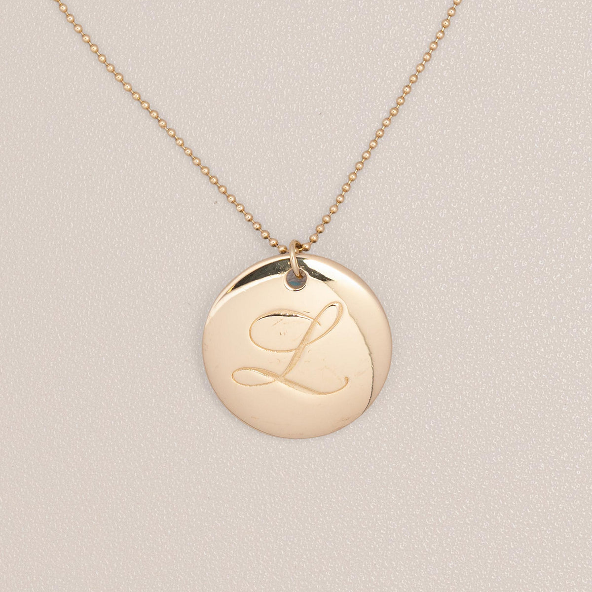 Tiffany & Co. 18K Yellow Gold Notes Letter L Pendant