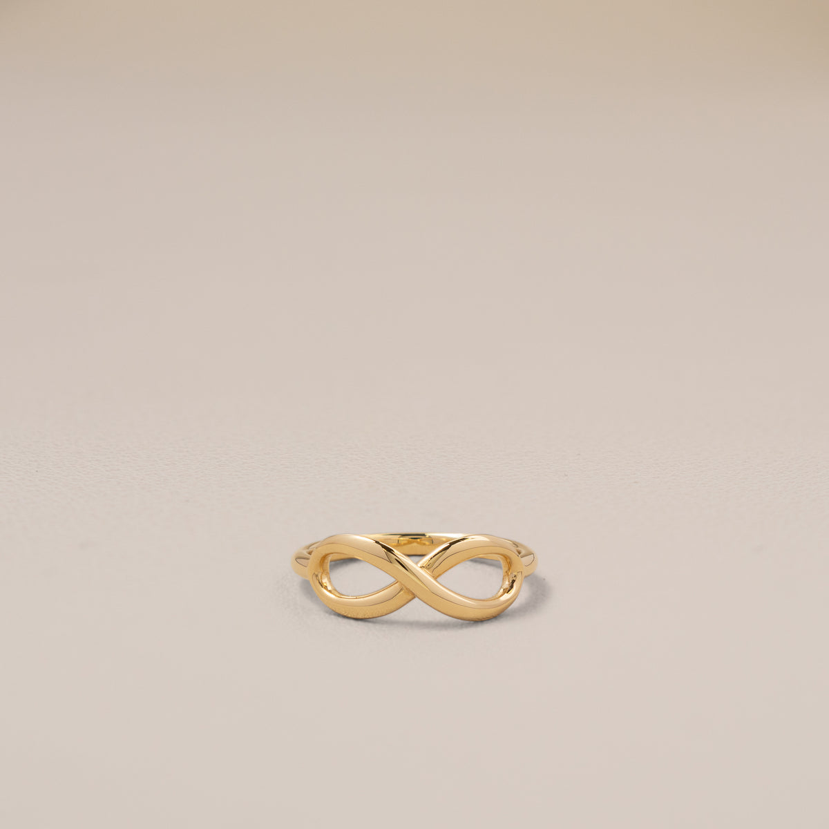 Tiffany & Co. 18K Yellow Gold Infinity Ring, Size 8 — front, close