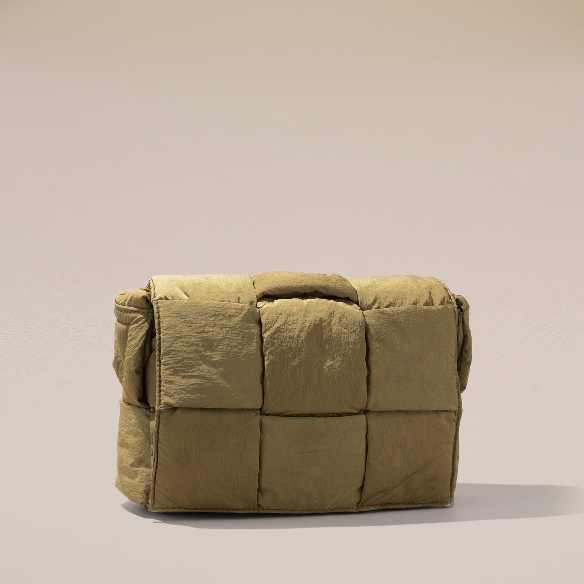Bottega Veneta Small Padded Tech Cassette, Mud — angle