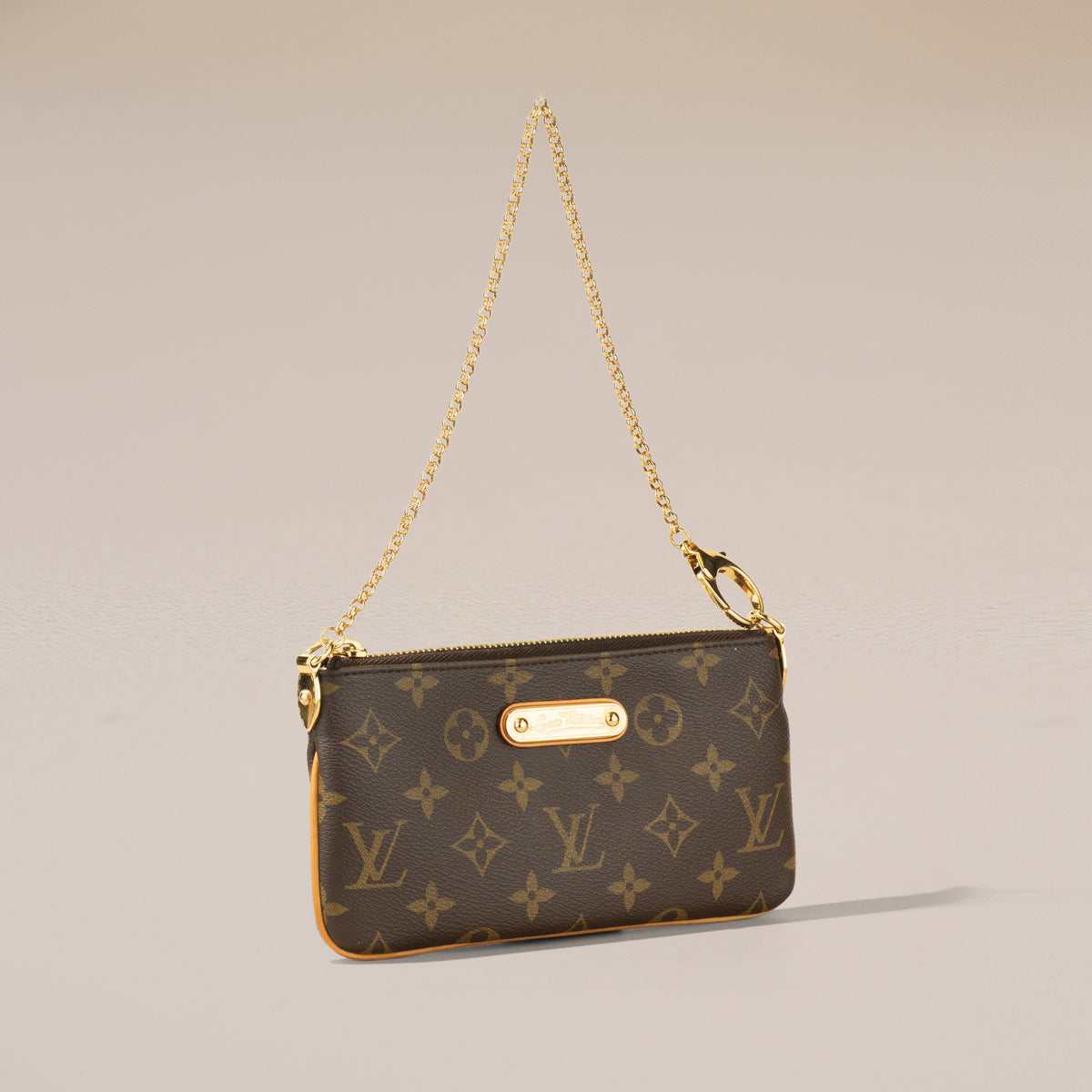 Louis Vuitton Pochette Milla MM, Monogram — angle