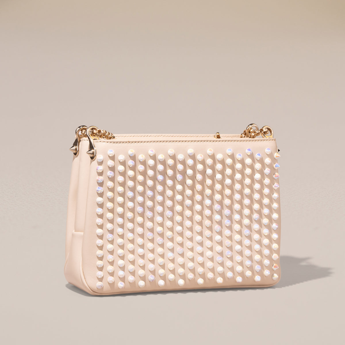 Christian Louboutin Triloubi Small Chain Bag, Ivory Calfskin — spiked face, angle