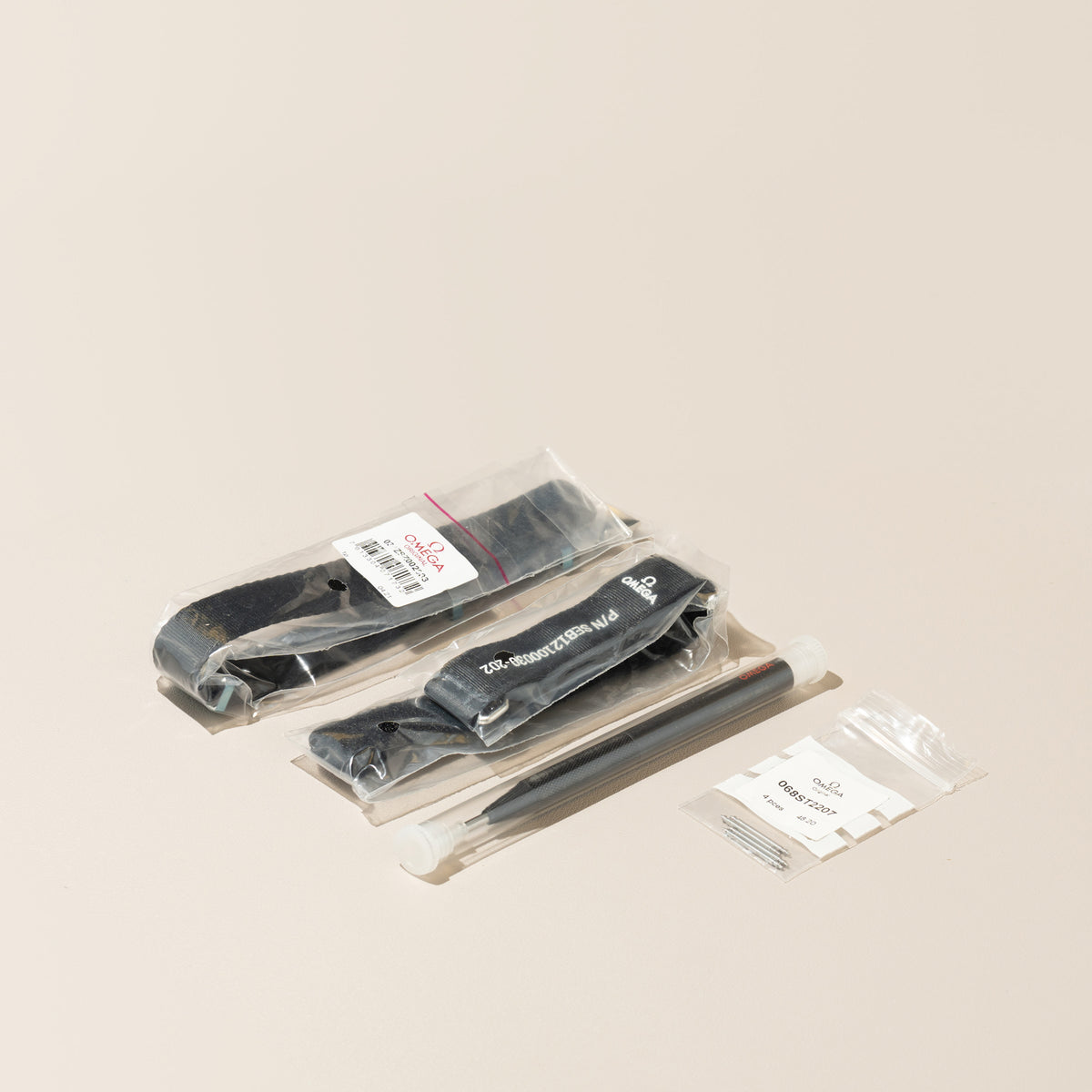 Omega Speedmaster Professional Moonwatch — original extra straps and strap tool