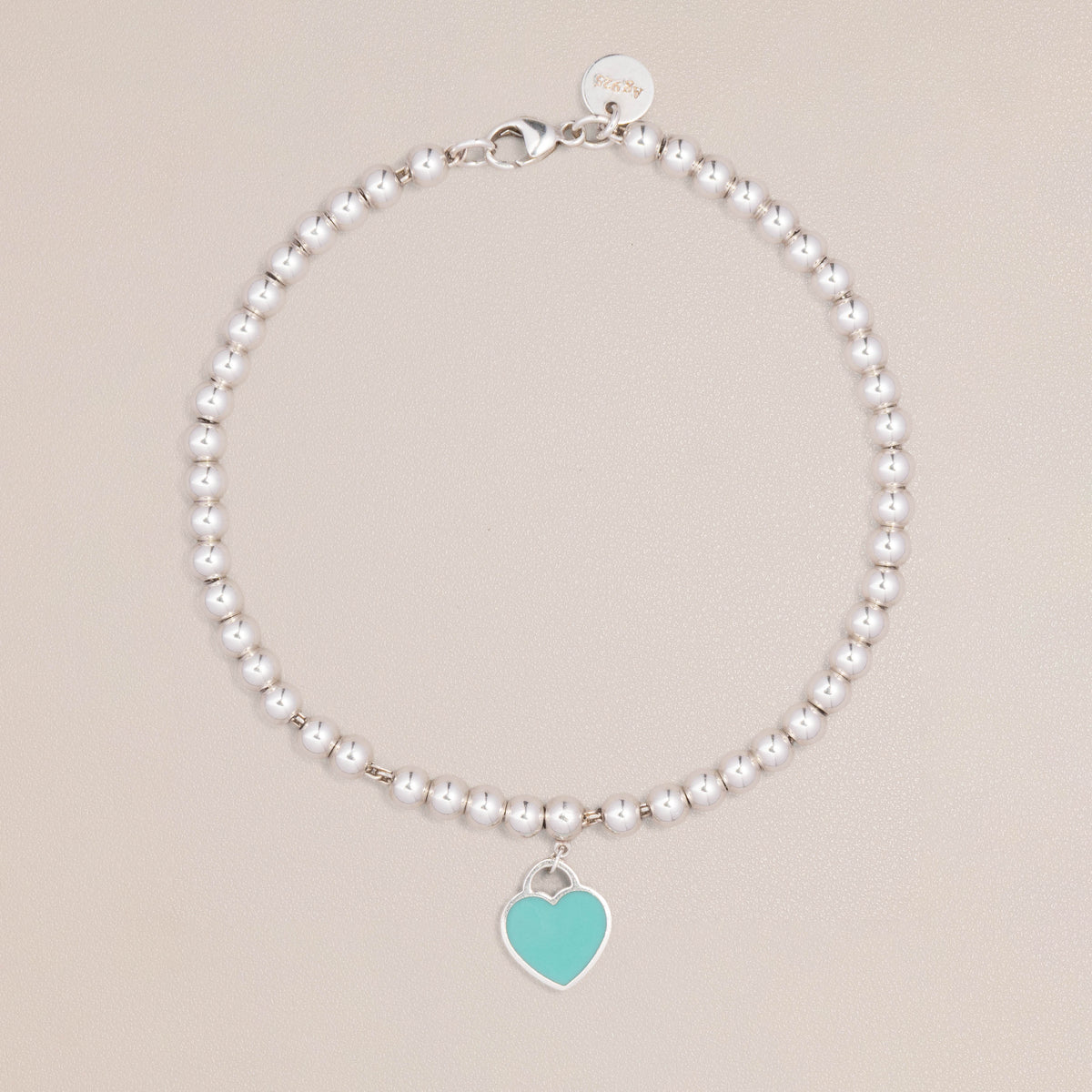 Tiffany & Co. Sterling Silver Blue Enamel Diamond Heart Tag Bead Bracelet — blue enamel side