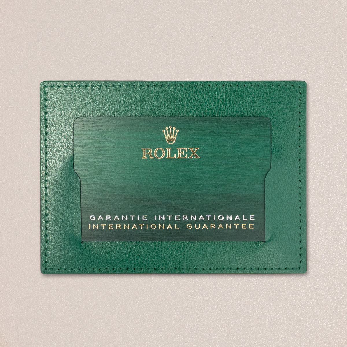Rolex GMT-Master II “Bruce Wayne” 126710GRNR, Grey and Black Bezel (2026) — original warranty card