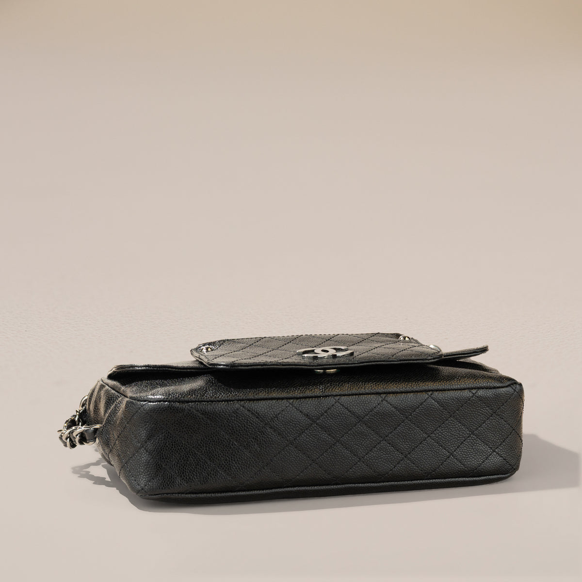 Chanel Pocket in the City Flap Bag, Black Glazed Caviar — base, angle