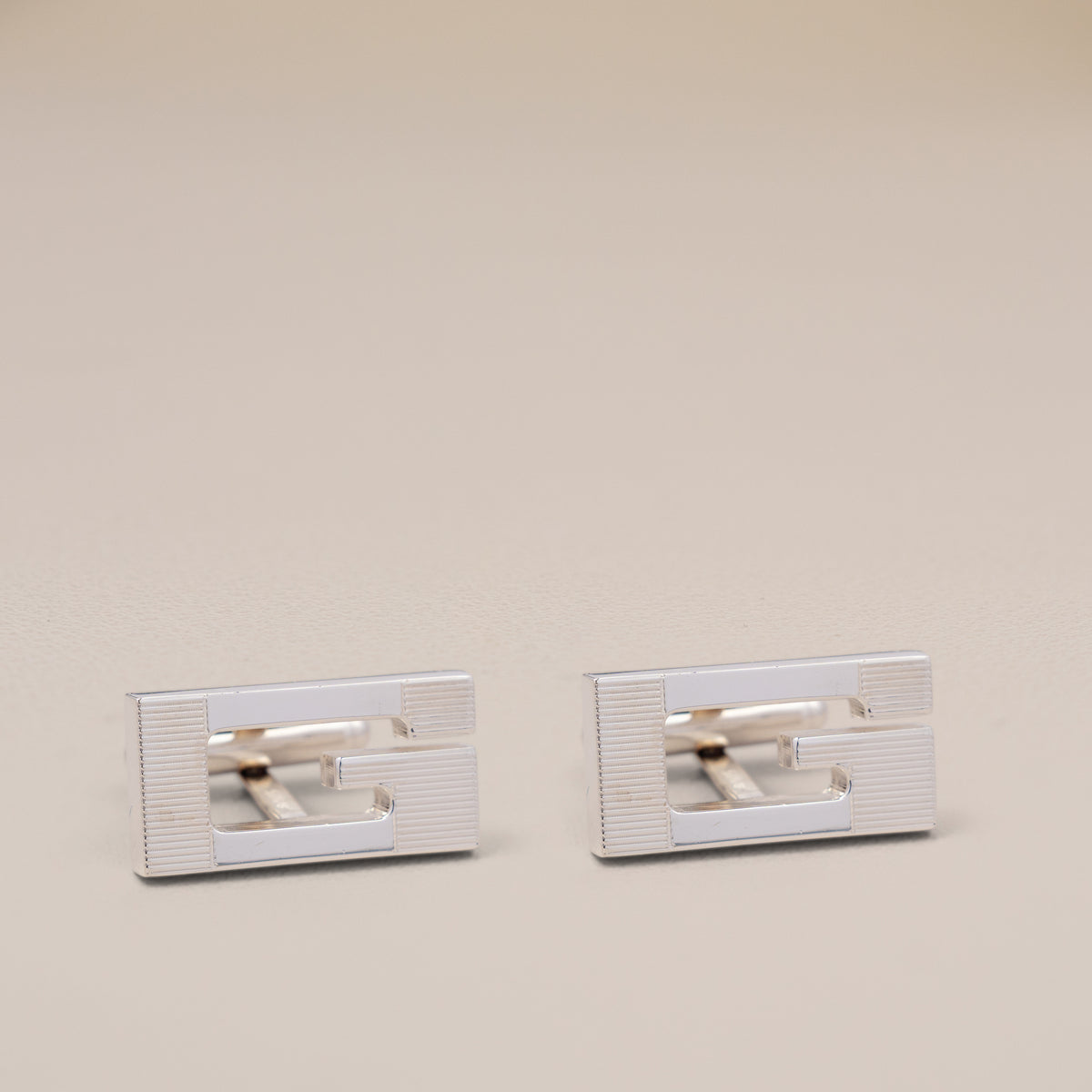 Gucci Sterling Silver Square G Cufflinks — detail